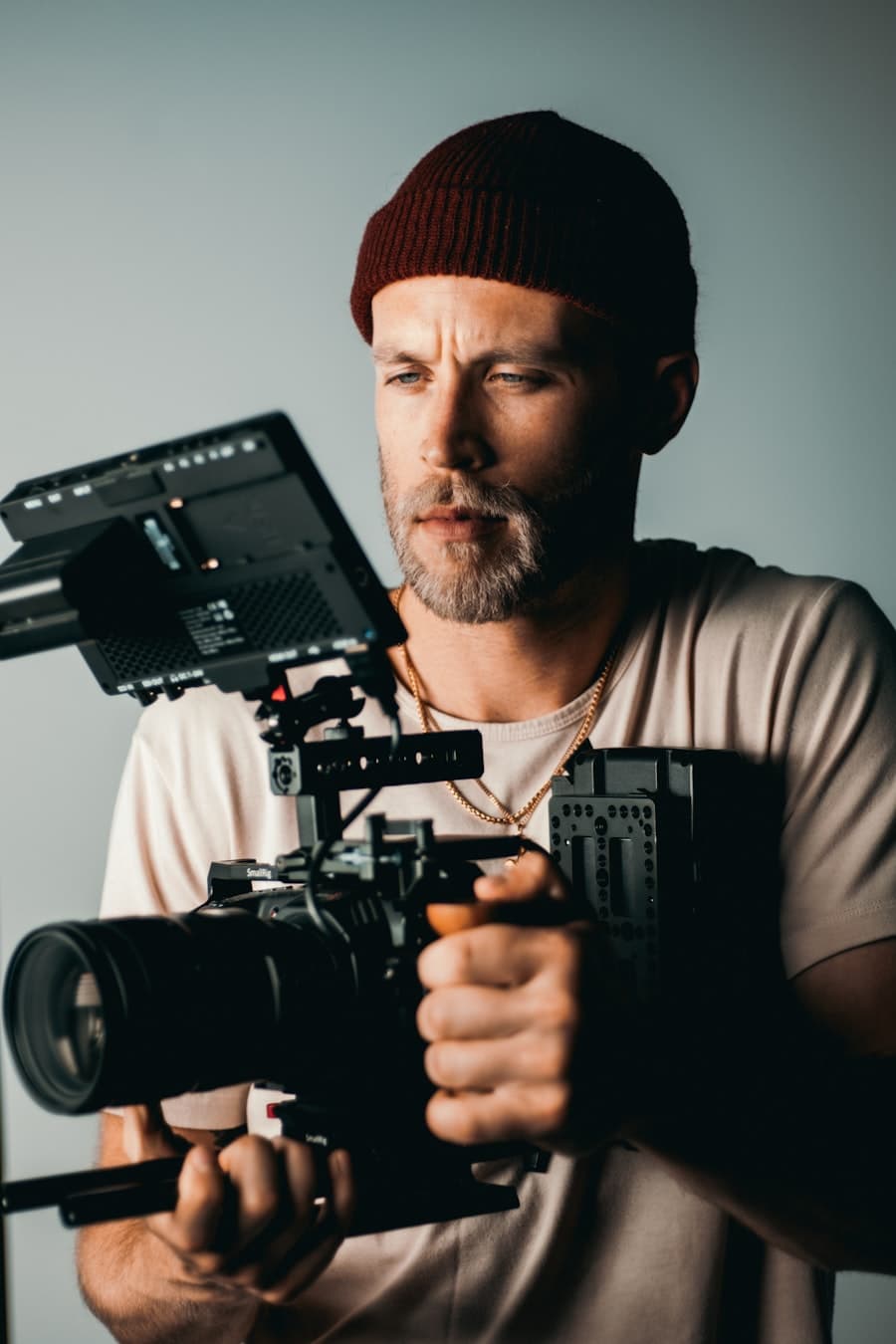 A filmmaker operating a cinema camera rig